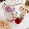 کیف زنانه چرم طبیعی با دهانه فلزی