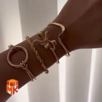 ست النگو و دستبند زنانه مدل Golden Ribbon & Wave محصول مرتبط